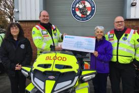 Photo: Pictured here (Left to Right) is Devon Freewheelers volunteer Vikki Finney, Blood Biker and duty rider Terry Dormer, Iris Butler, Churston Golf Club ladies captain from 2020-2021, and deputy CEO, Russell Roe. Image: Devon Freewheelers.