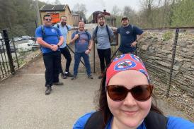 Amy, front, with Tony, left, teamed up with a group of friends to walk the Drakes Trail in aid of the Devon Freewheelers. Photo: Amy and Anthony Ewens.