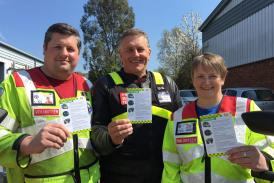 Photos show: Left to right, Devon Freewheelers volunteer Anthony Ewens, Tony Heywood from DSFRS and charity Blood Biker, Emma Pring, with the Crash Cards. Credit: Devon Freewheelers.