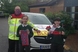 Devon Freewheelers Deputy CEO Russell Roe with pupils at St Joseph's Catholic Primary School 