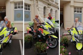 Photos show members of the Torquay and District Scottish Society with one of the Devon Freewheelers Blood Bikes outside the Victoria Hotel. Credit: Torquay and District Scottish Society.