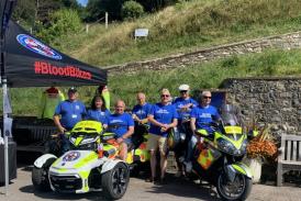 Photo shows the Devon Freewheelers volunteers teaming up with the Buffs at Beer for the tombola fundraiser, in Jubilee Gardens.